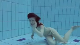 White Swimsuit with Tattoos Babe Roxalana Cheh Underwater