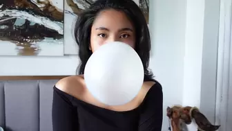 Cute Girl makes Big Bubbles with Bubblegum