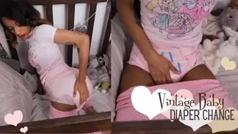 Vintage Diaper Girl Changes in Crib