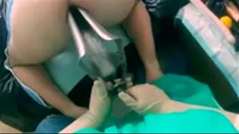 Medical rectal examination with a giant speculum