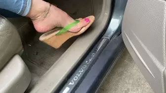 Dangling Cork Wedge Flip Flops in the Volvo