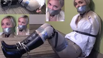 Blake falls off her chair cause she is struggling against her bonds ( Part 2 of Strapping and taping up