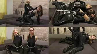 Lusty beauties in latex caught, gagged, drooling and trying to escape