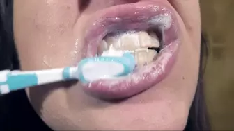 Brushing my teeth thoroughly and playing with mouth and lips