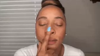 Kendra plays with her nose