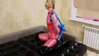 Alla wears a bondage of their balloons and wears a latex catsuit and over the knee boots !!!