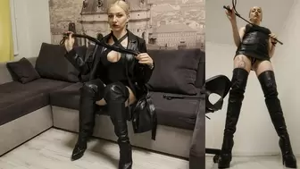 Strict mistress in a totally leather outfit