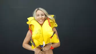 Bunny Tries on a Used Airplane Life Vest 4K (3840x2160)