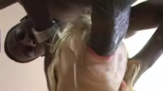 The giant black cock seals her pussy and there is agony on her face