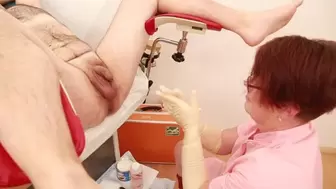 Medical ass fisting by mature head nurse on the gyno chair