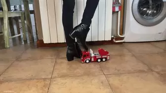 TOY TRUCK CRUSHED UNDER HER BOOTS - MP4 Mobile Version