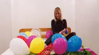Alla inflates 12 balloons with a compressor and makes a fun sit2pop!!!