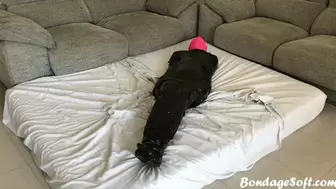 Mummified in black tape and try to escape