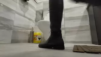 Heavy toilet visit in leather clothes