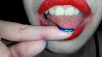 Licking my blue nails