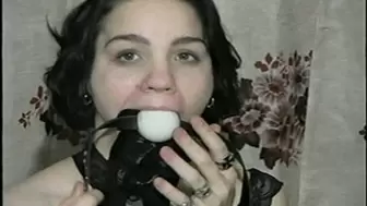 24 YR OLD FRAU, TAPE, TIES, HANDCUFFS, & GAGS HERSELF WITH HER WORN SMELLY PANTYHOSE & HELD IN WITH A BALL-GAG