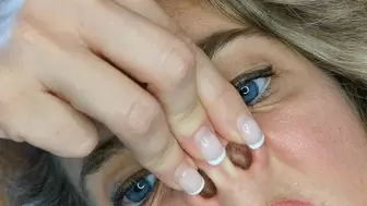 Close up pinching nose