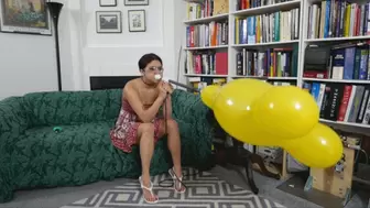 Raquel Blows a Mouse Figurine Balloon (MP4 - 1080p)
