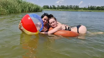 swimming on a tube and a ball