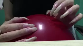 Popping balloons with nails