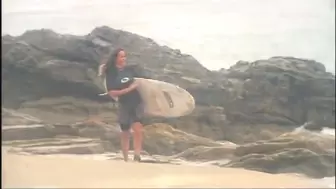 Surfer slut has oral sex on the beach with longhaired dude then fucks him