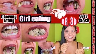 3D VR Virtual Reality Pretty girl eats a sandwich with boiled ham and very hard corn kernels that crack hard shows you her teeth and her mouth with her sharp teeth