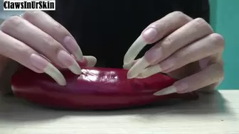 Scratching and cutting pepper with my long nails