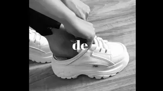 Sneakers and socks - Sneakers goddess 'Carla Marquesa de la Pata' showing her feet and slides into her white platform sneakers