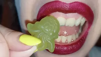 Chewing and eating gummy octopus