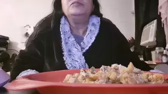 Latina milf in a robe eats lunch