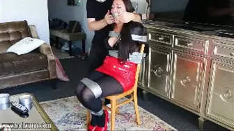 Taped up to a chair, wraparound tape gagged and humiliated in bondage, that's how Nyssa spent the night!
