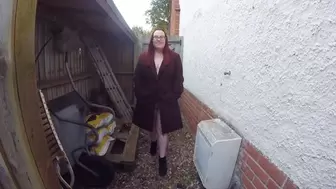 Redhead Strutting in the Yard in Ankle boots and long coat
