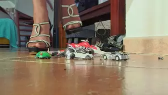 Black clasic platform sandals on heels with Swarovsky slides crushed quad bike and three small cars FULL HD (View from the second camera)