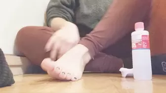 Putting nail polish on my toes