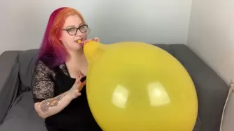 Blowing up and sit to pop a balloon