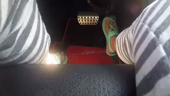 Strappy turquoise sandals behind the wheel PEDAL PUMPING