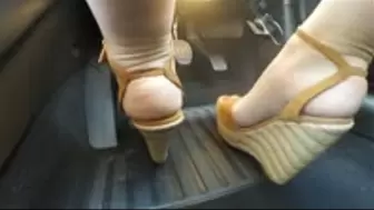 Driving to work in her beautiful Wedges - Floor View