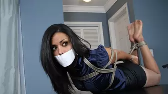 Layla Sin Thought Sitting on a Table Completely Bound and Gagged Was Tough - Then She Got Hogtied!