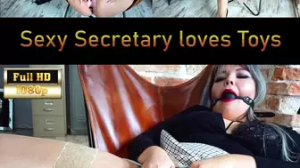 Your sexy Secretary playing with her vibrator wearing a shiny buttplug