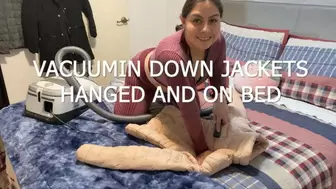 VACUUMING DOWN JACKETS HANGED AND ON BED