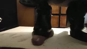 Slave gets his balls severely crushed full weight under heel boots with aggressive tread!