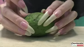 Crushing the fruit with my long nails