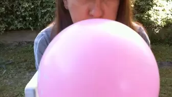 Balloons play in a public garden