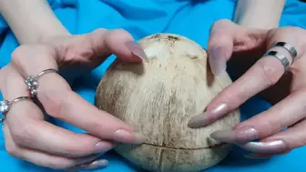 Scratching coconut long natural nails