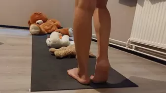 Sandra is trampling and crushing multiple teddybears barefoot while playing darts