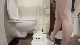 Fatty girl in home on toilet