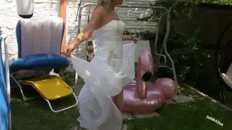 In a wedding dress and Fishnet Pantyhose in a Pool