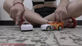 Lorena vs 2 toy cars