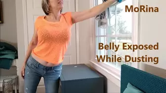 Belly Exposed While Dusting