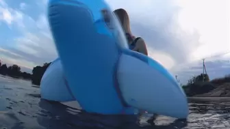 Alla rides a transparent blue inflatable whale on the lake and hotly fucks him getting an orgasm!!!